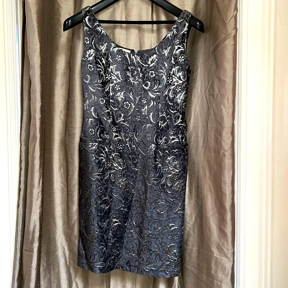 Valentino metallic embroidered sleeveless dress. Faux front pockets.